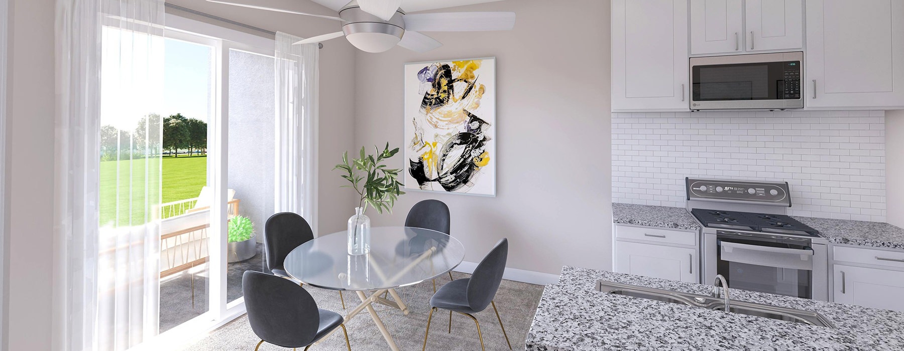 spacious and well lit kitchen with granite counter tops and stainless steel appliances 